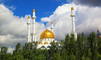 a mosque in Kazakhstan with golden domes