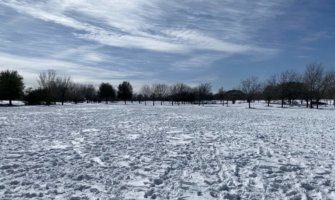A snowy field in Austin, Texas after a snow storm in 2021